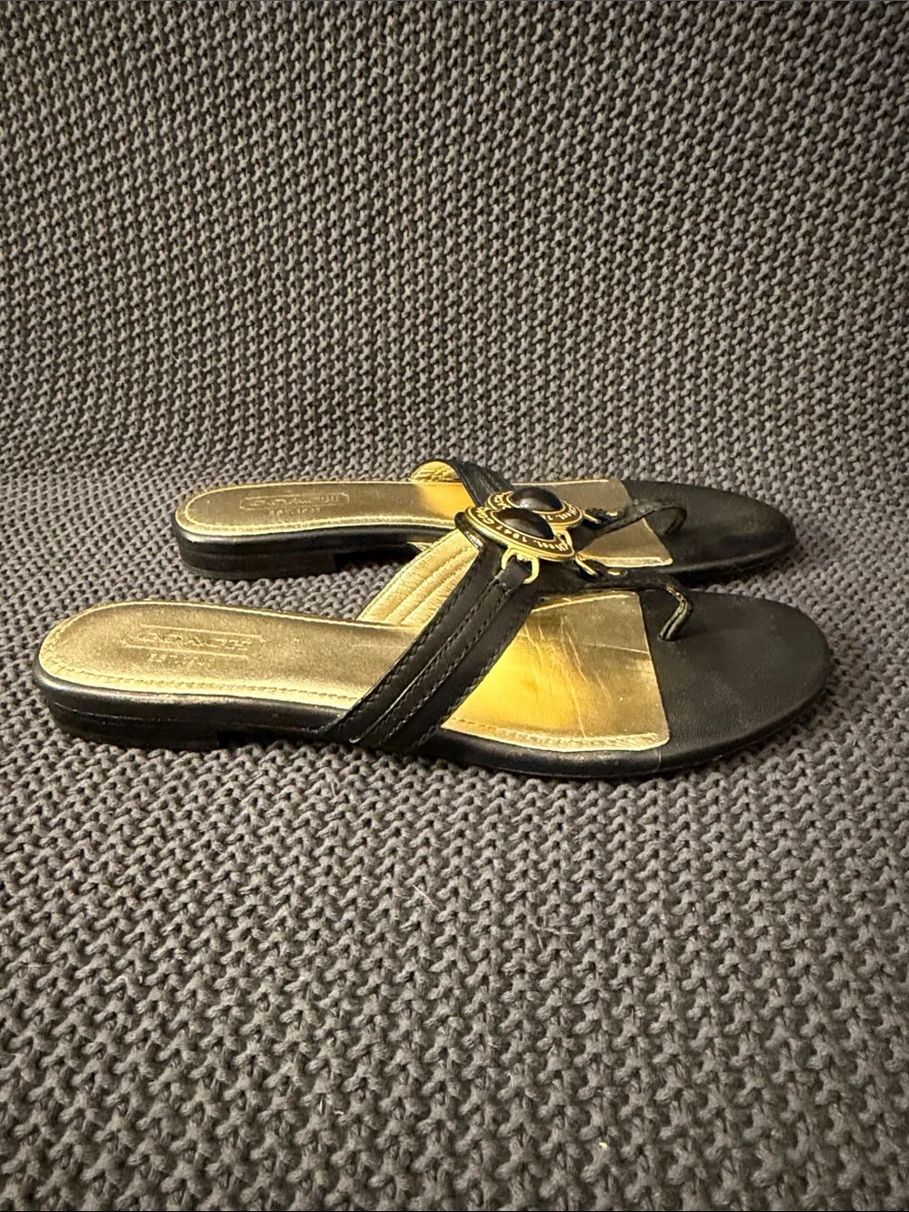 Coach Black Leather Thong Sandals with Gold Medallion